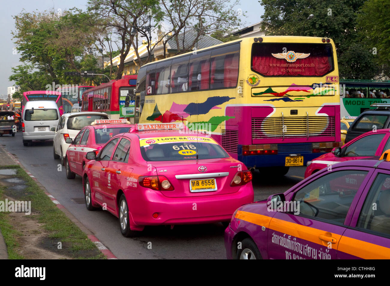 Bus and automobile traffic near the Grand Palace in Bangkok, Thailand. Stock Photo