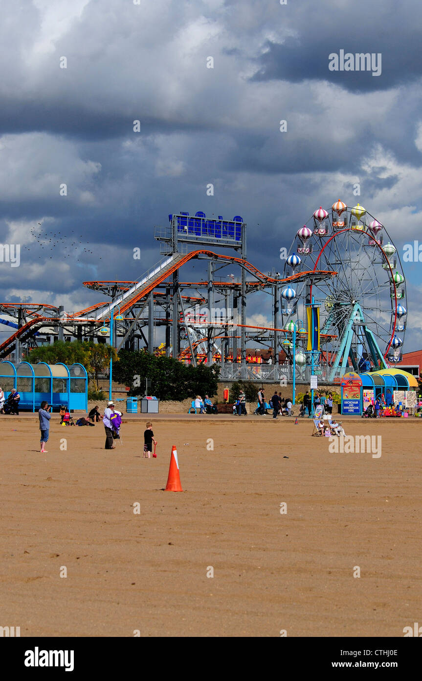Sand and funfair at Skegness; Lincolnshire; UK August 2011 Stock Photo