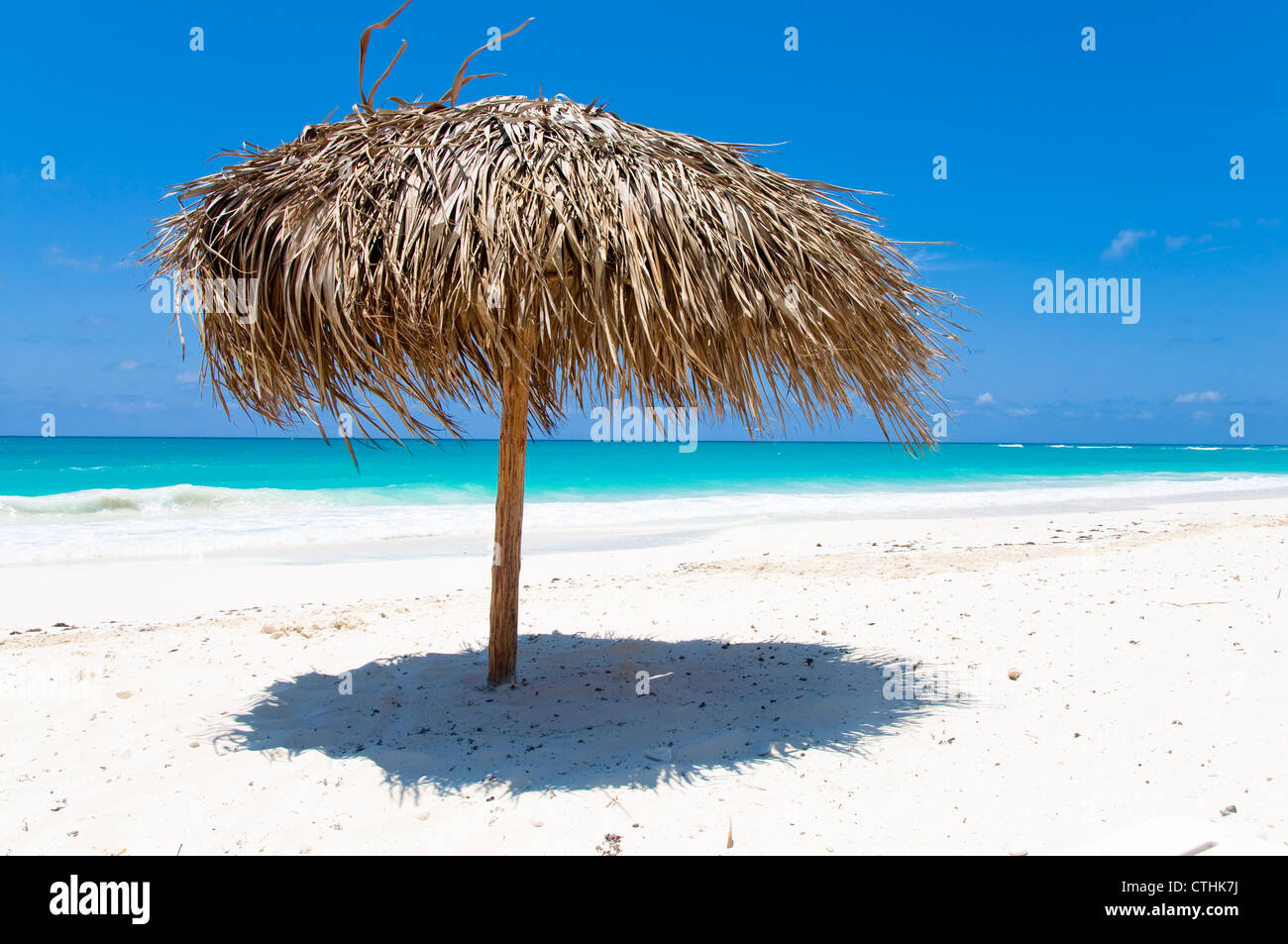 Palm tree beach umbrella, Cayo Largo del Sur, Cuba Stock Photo