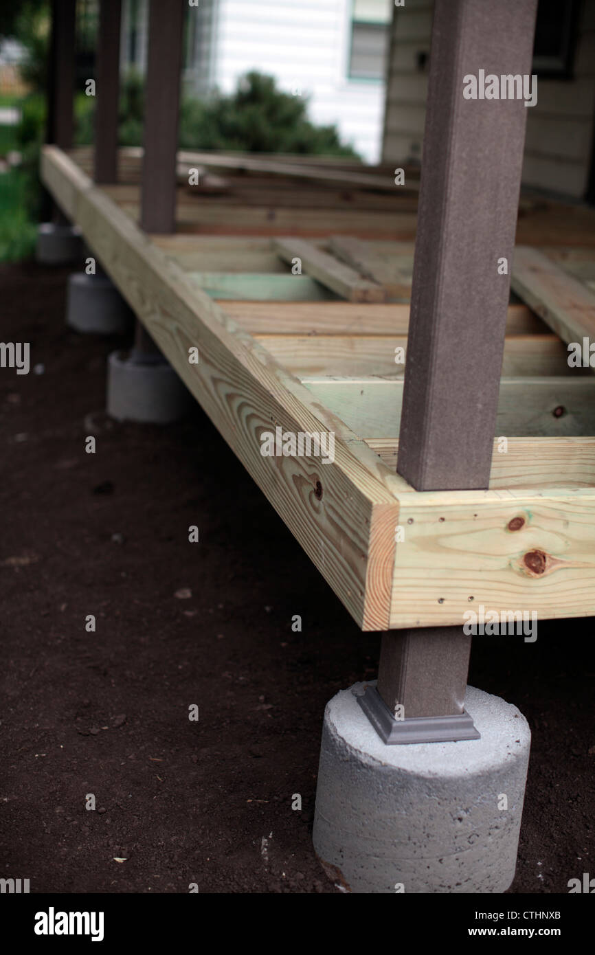 Corner of porch deck substructure, showing joists and spare boards. Stock Photo