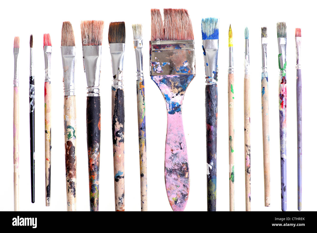 Various dirty paint brushes isolated on white Stock Photo Alamy