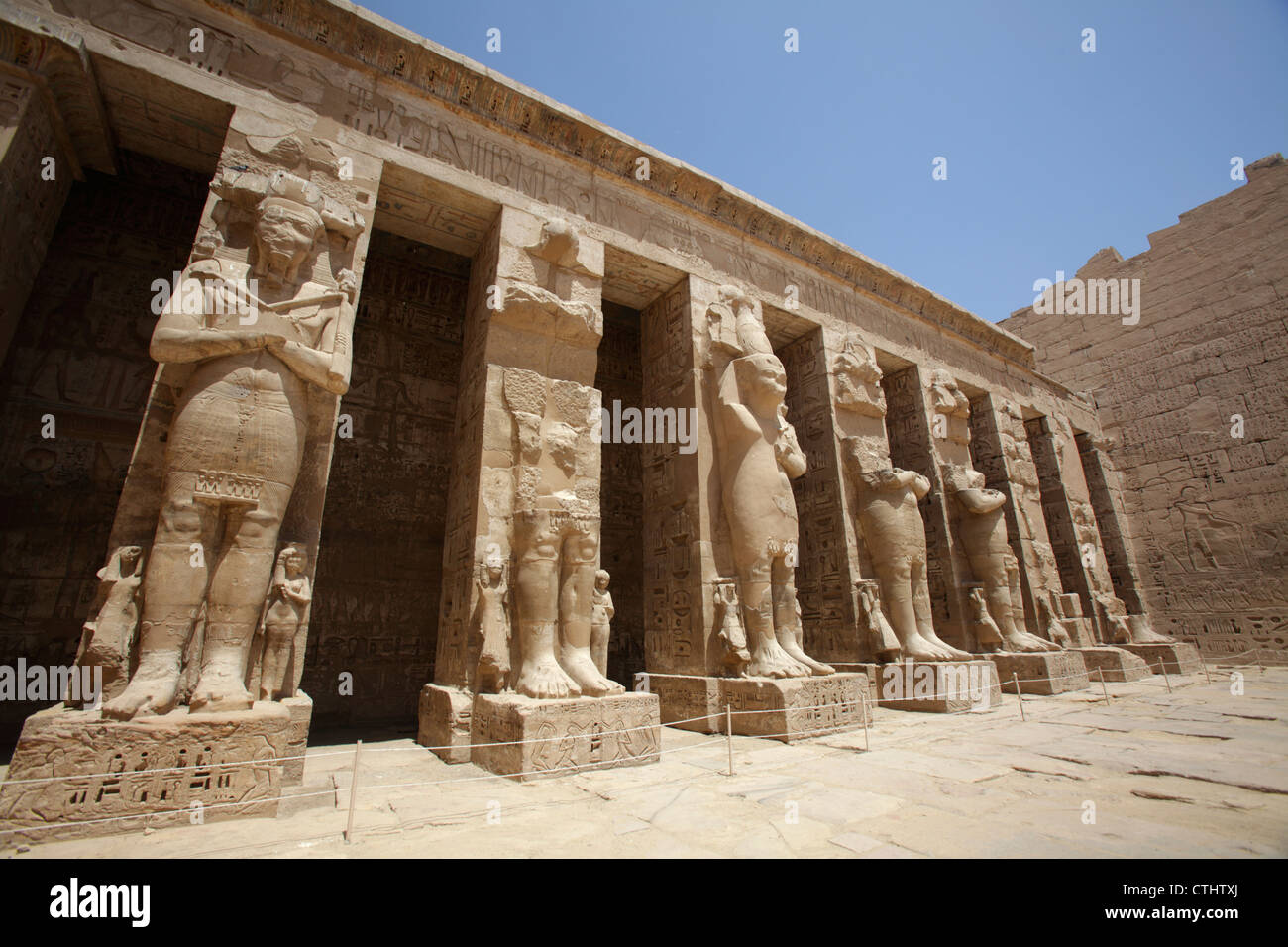 Ramessid columns in the peristyle court of temple of Ramesses III of Medinet Habu, Luxor, Egypt Stock Photo