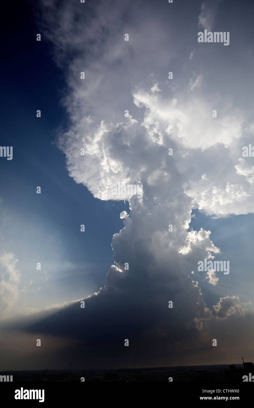 A narrow area of convection rises into a stratocumulus cloud, like a mushroom cloud. Stock Photo
