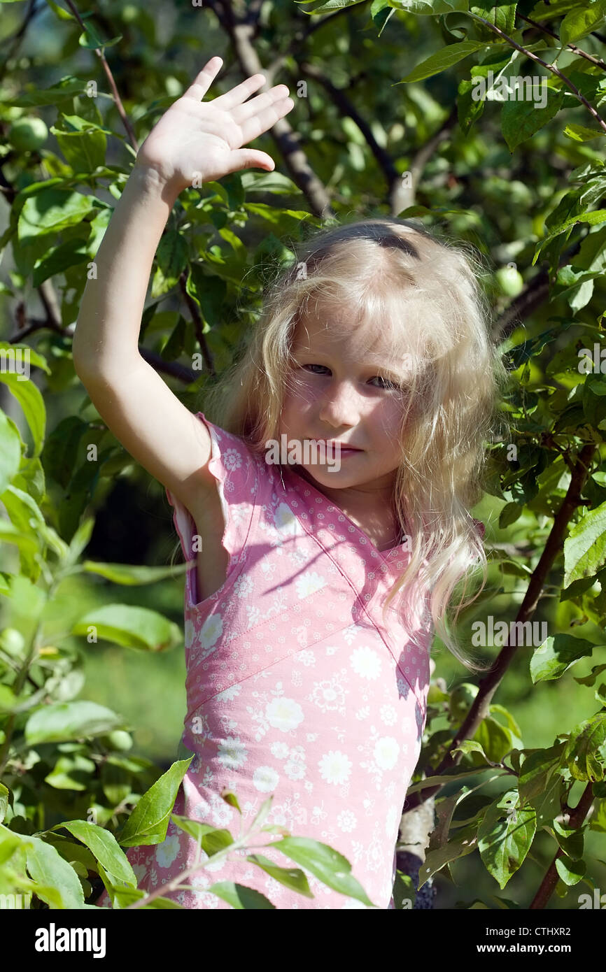 little blonde girl on sunny summer background Stock Photo - Alamy