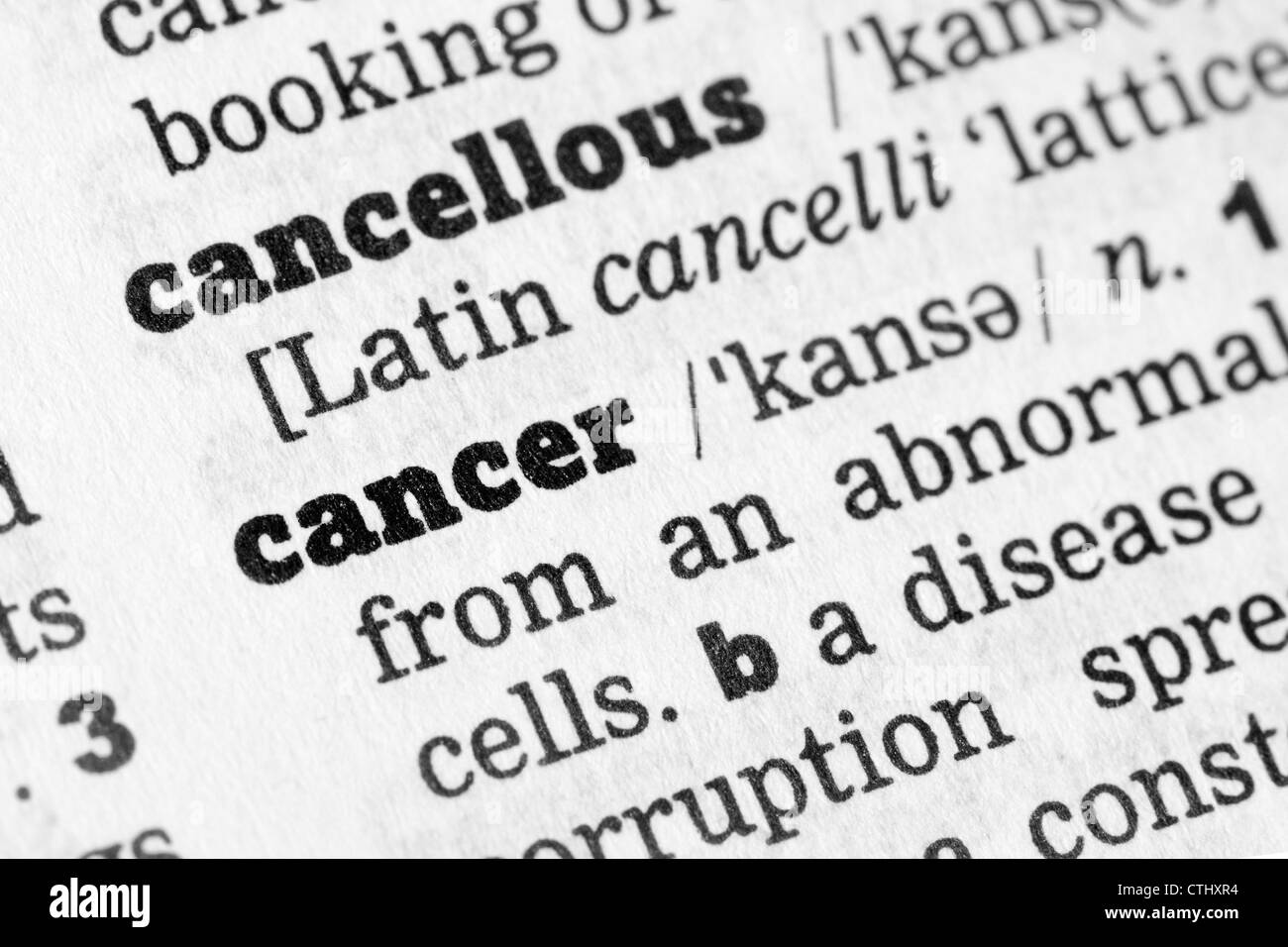 Cancer Dictionary Definition single word with soft focus Stock Photo