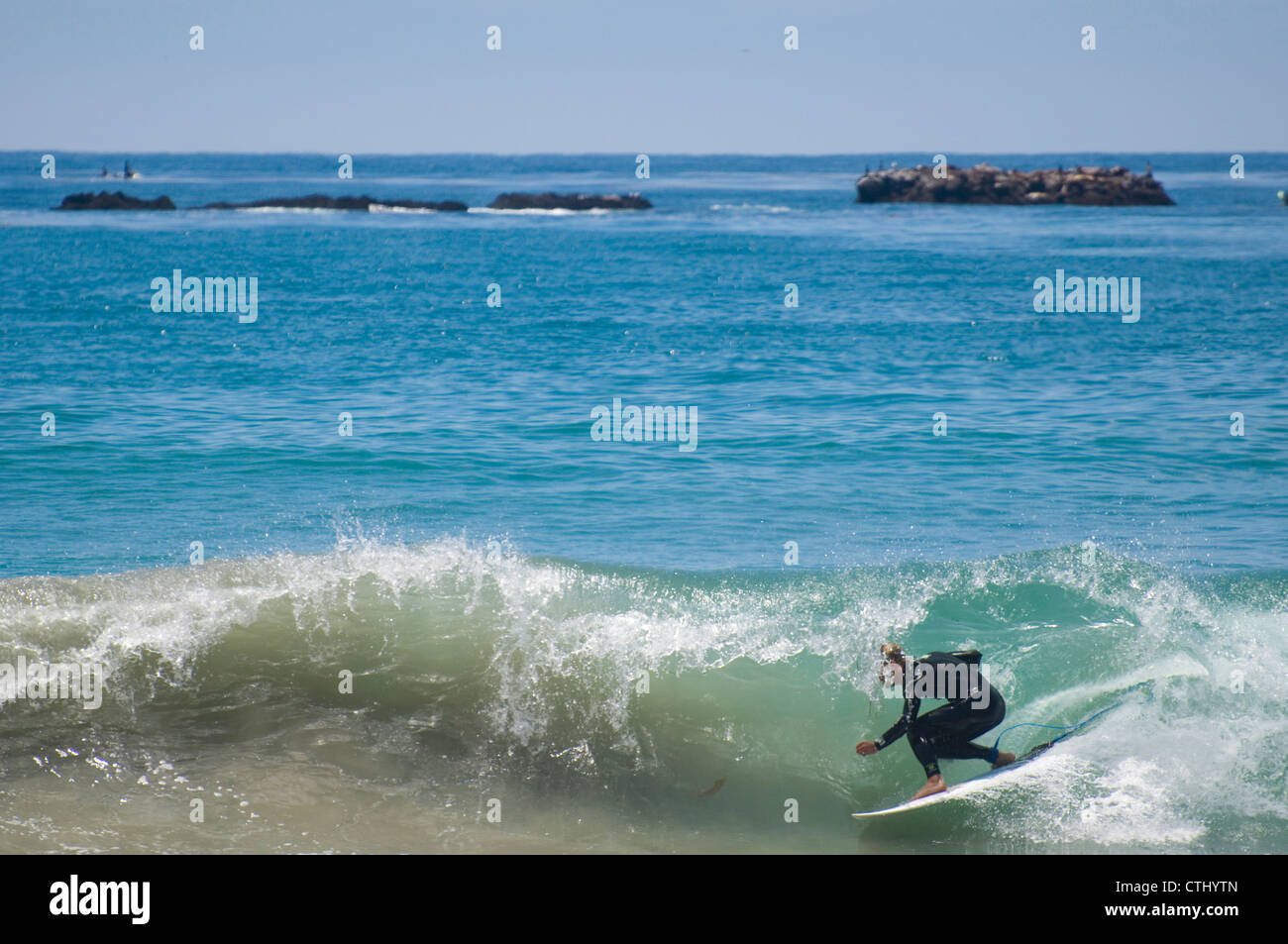 Surfer getting tubed in San Clemente, California Stock Photo