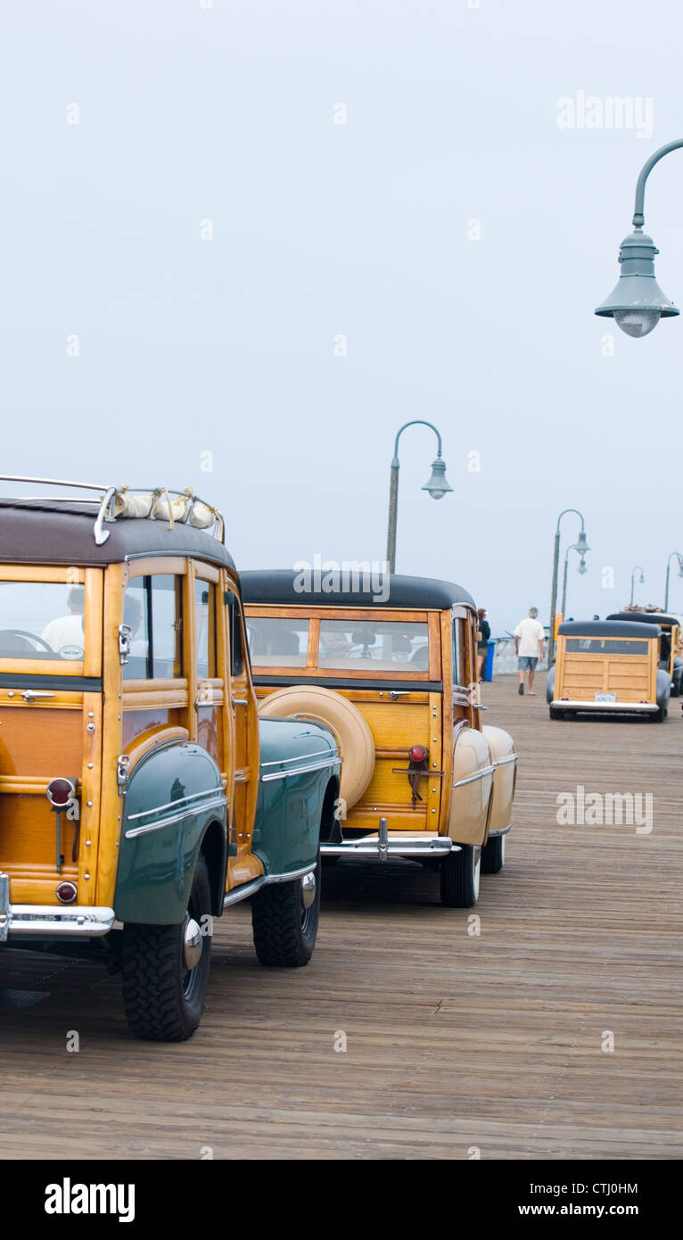 Classic Woodie Cars on the San Clemente Pier in San Clemente, California during the San Clemente Ocean Festival Stock Photo