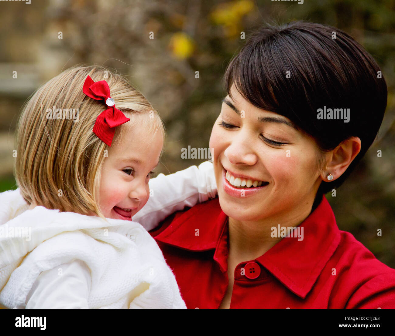 Portrait Of A Mother And Her Daughter With Down Syndrome; Cambridge, England Stock Photo