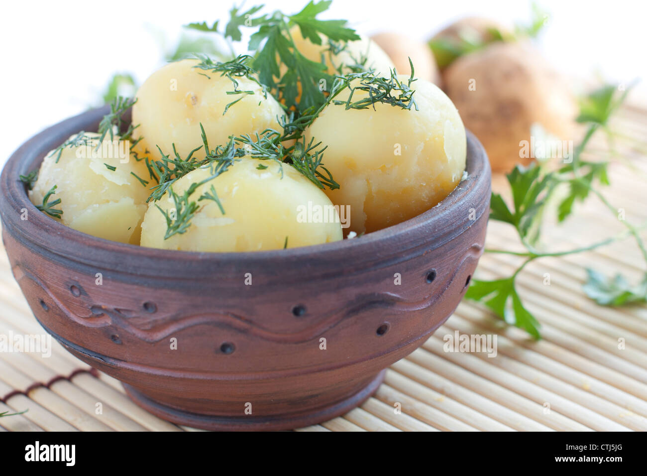 Boiled potatoes with green dill, closeup Stock Photo
