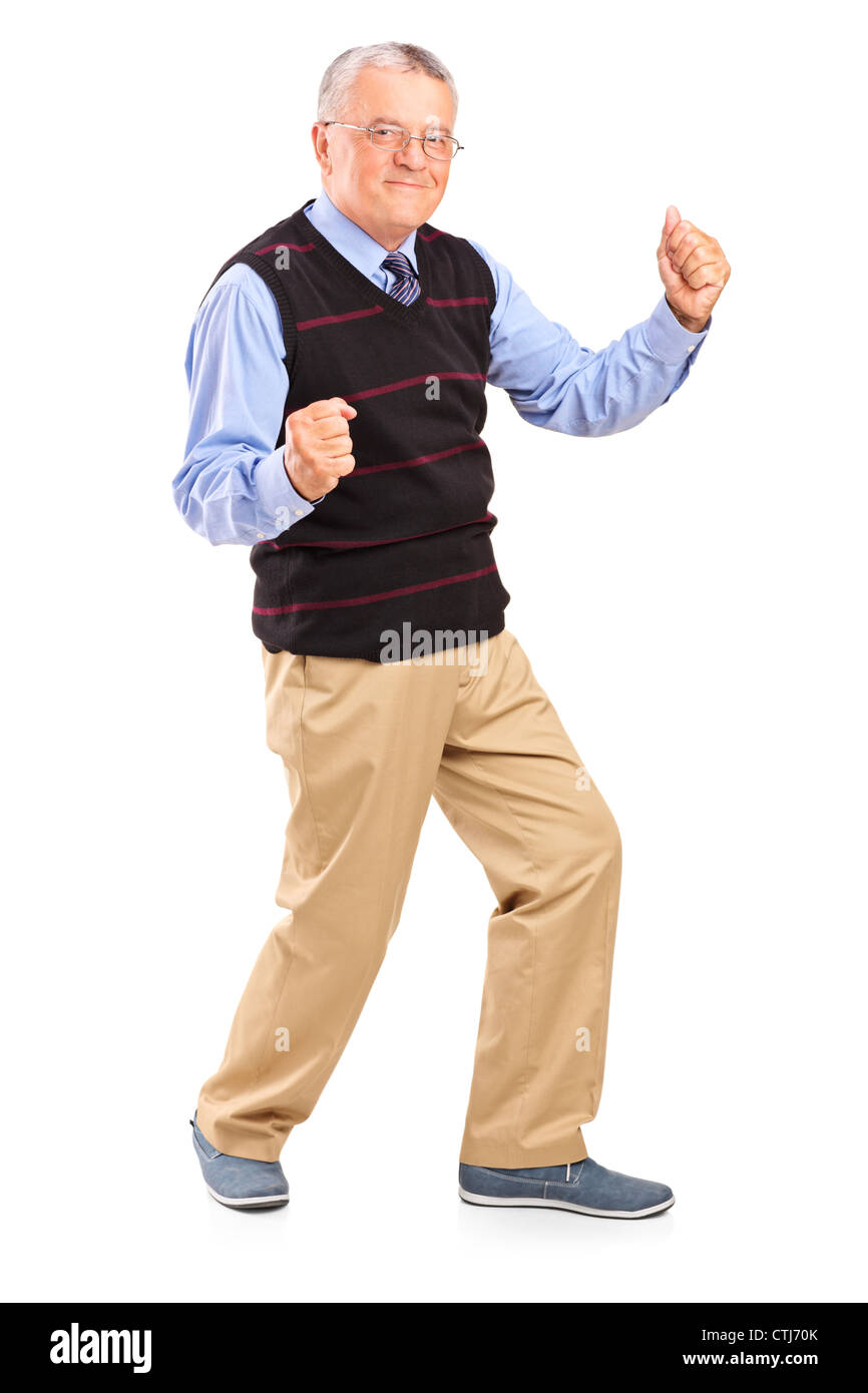 Full length portrait of a happy mature man, isolated on white ...