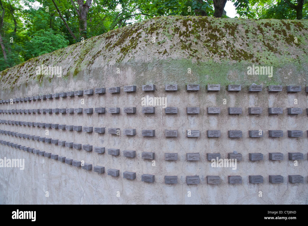 Wall circling Judischer Friedhof the Jewish cemetery with name plates of the dead Frankfurt am Main city state of Hesse Germany Stock Photo
