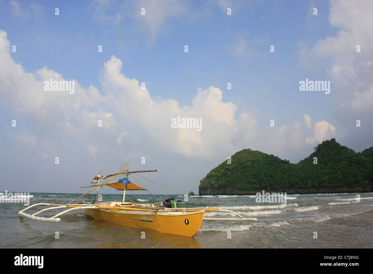 Outrigger boat near beach, Philippines, Southeast Asia Stock Photo