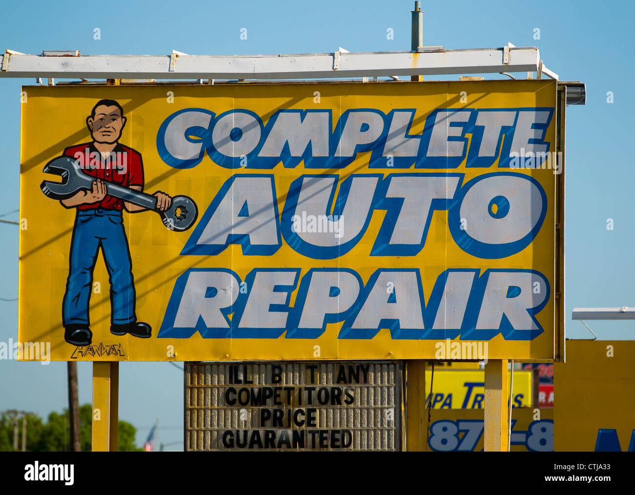 Sign above an auto repair shop Stock Photo Alamy