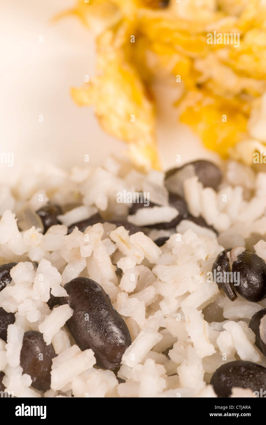 Rice and black beans, gallo pinto, served with scrambled eggs Stock