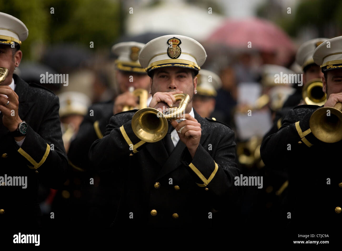 A band of bugles and drums plays in an Easter Holy Week procession in