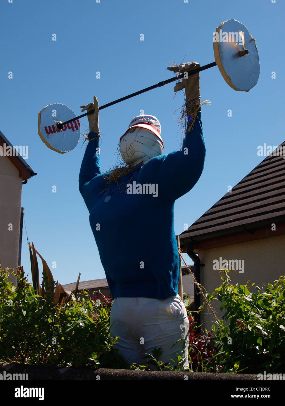 Weightlifter, Kilkhampton Olympic themed Scarecrow Festival 2012, Cornwall, UK Stock Photo