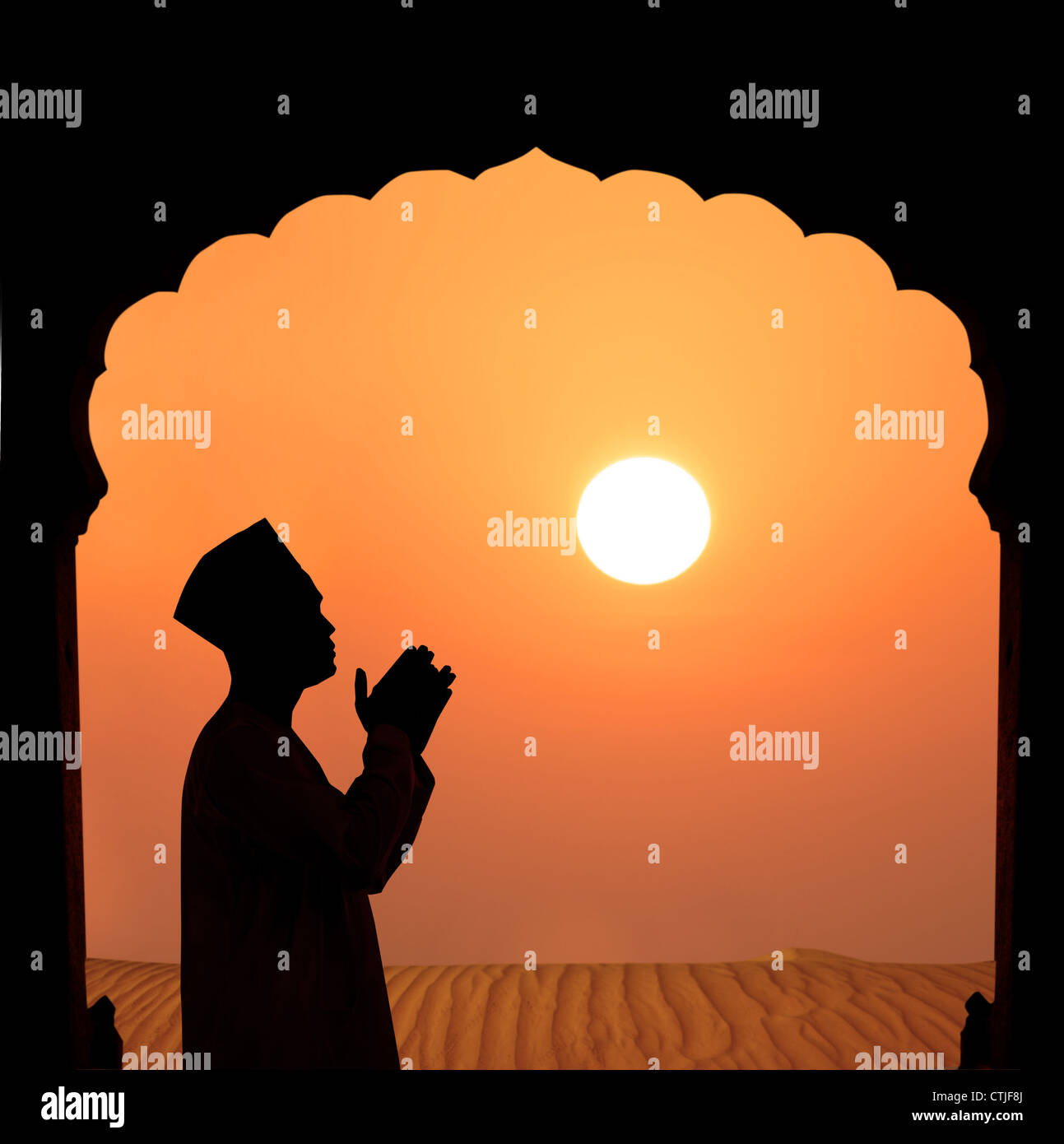 silhouette of a muslim male praying on the desert, islamic architecture ...