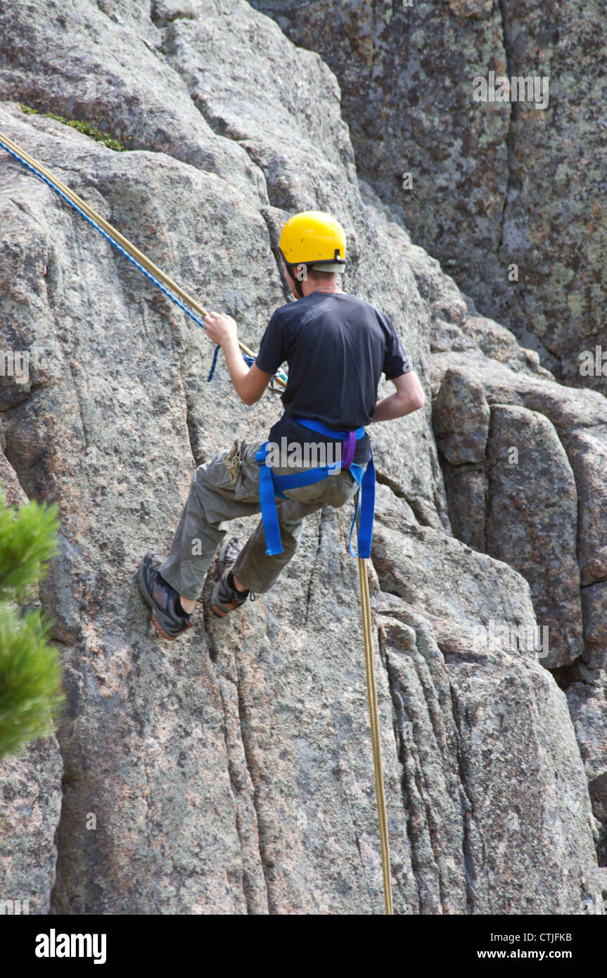 repelling down a cliff Stock Photo Alamy