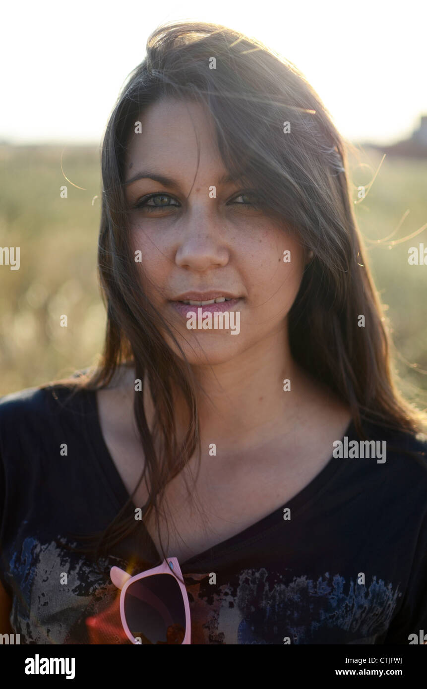 Exterior portrait of cute young woman Stock Photo - Alamy