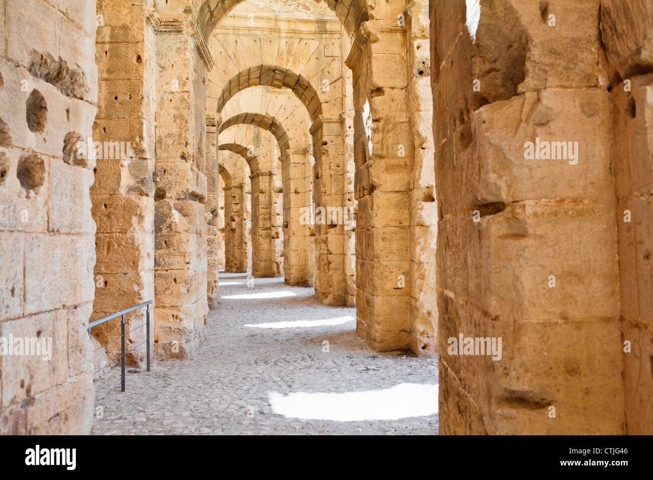 Demolished ancient walls and arches in Tunisian Amphitheatre in El Djem, Tunisia Stock Photo