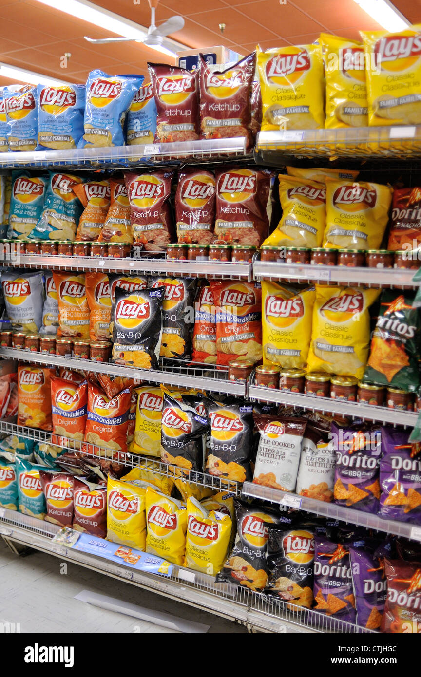 A display of potato chips is photographed in a grocery store, at Montreal on July 23, 2012. Stock Photo
