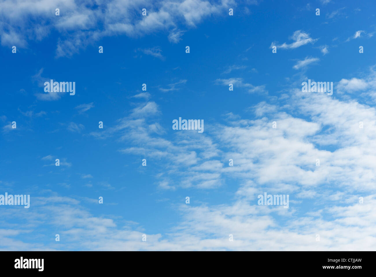 Blue sky with light cloud cover Stock Photo