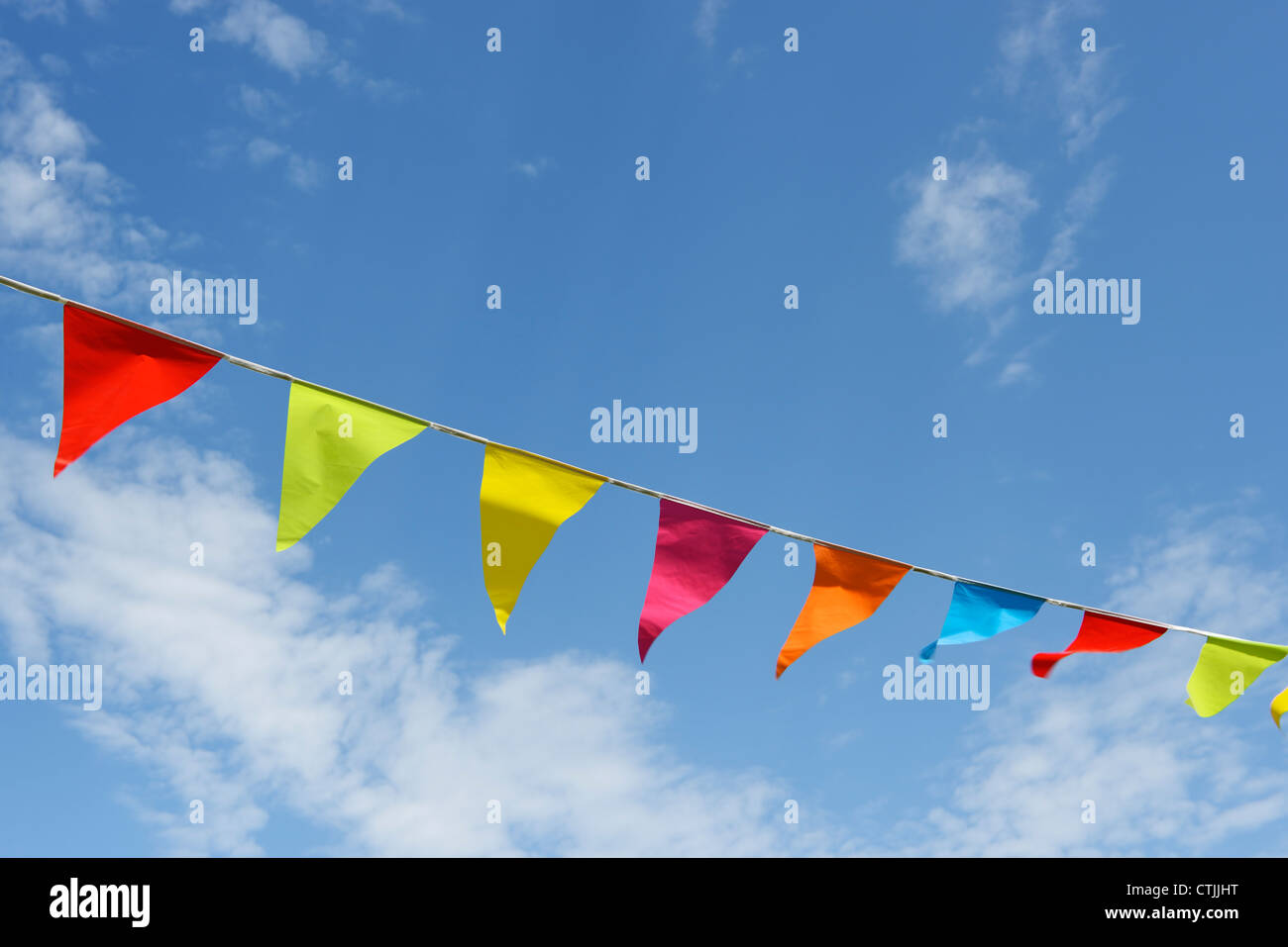 Colourful bunting and blue sky Stock Photo