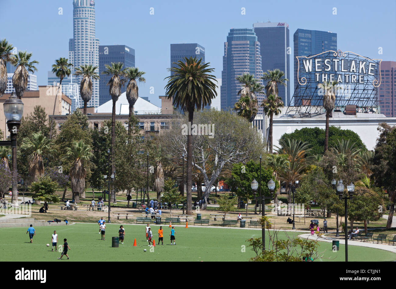 Los Angeles, California - A soccer game in MacArthur Park, with downtown Los Angeles in the background. Stock Photo