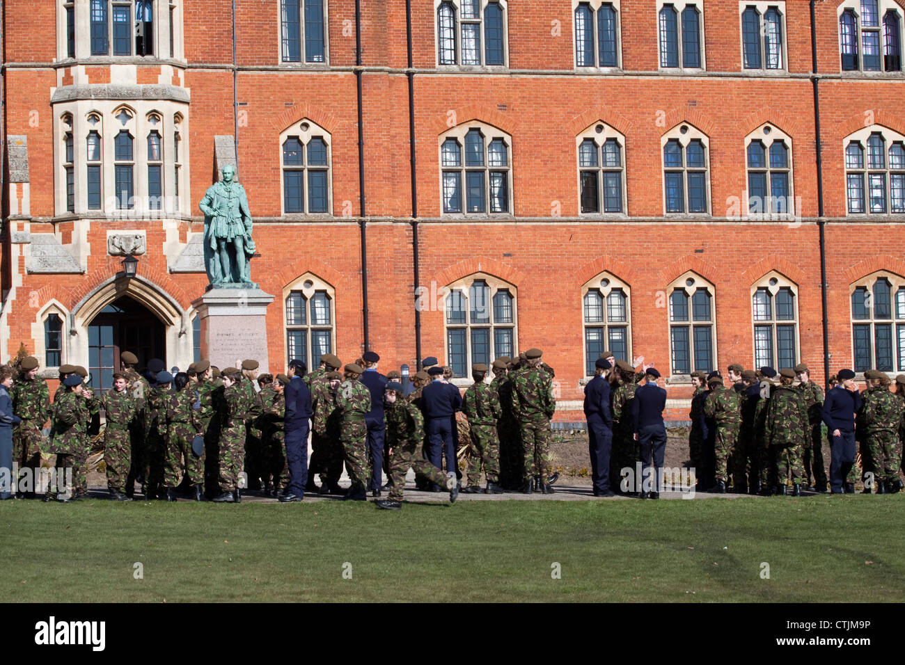 Pupils at a Suffolk private school mingle after a combined cadet force inspection. Stock Photo