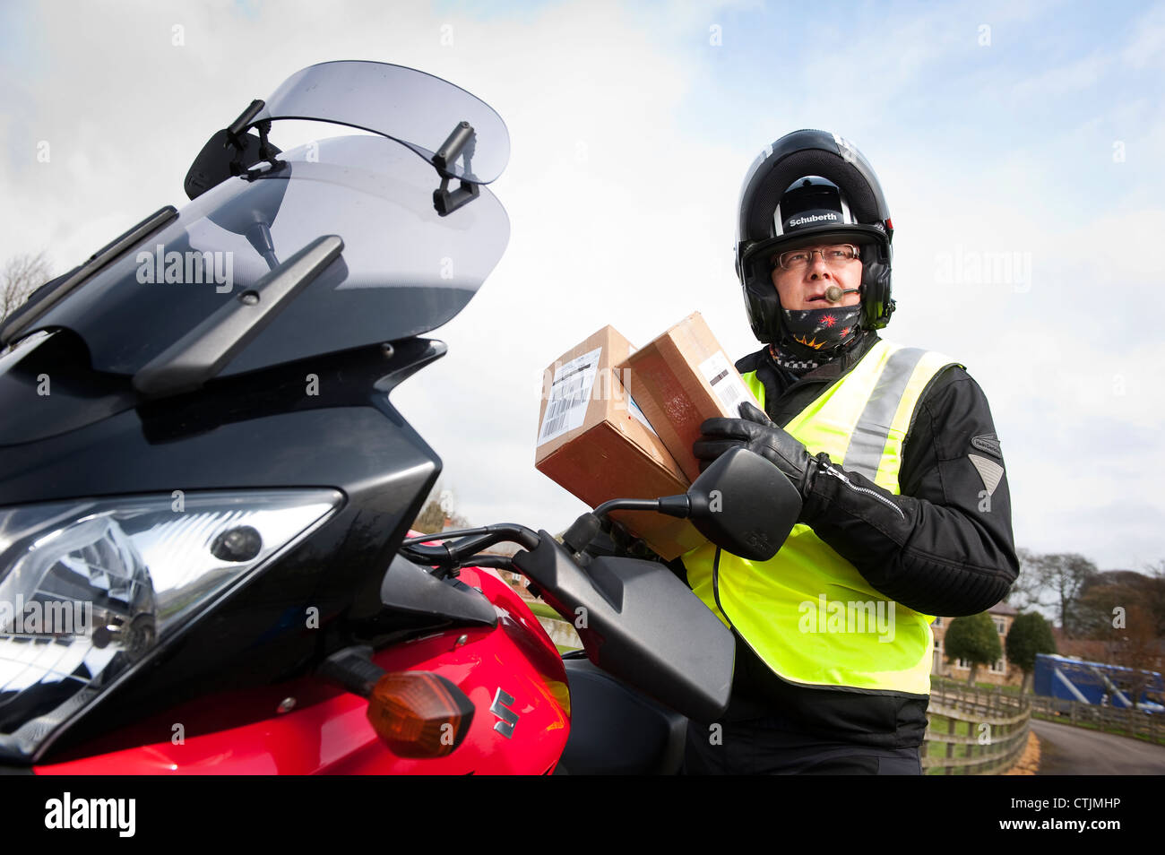 Motorbike delivery hires stock photography and images Alamy