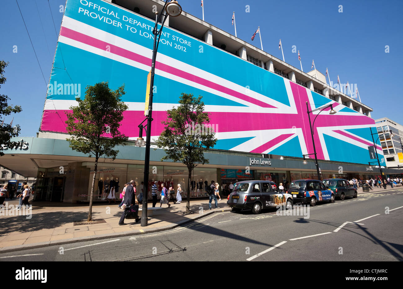 John Lewis Oxford Street salutes the London 2012 Olympic Games with a gigantic Union Jack flag, London, England, UK Stock Photo