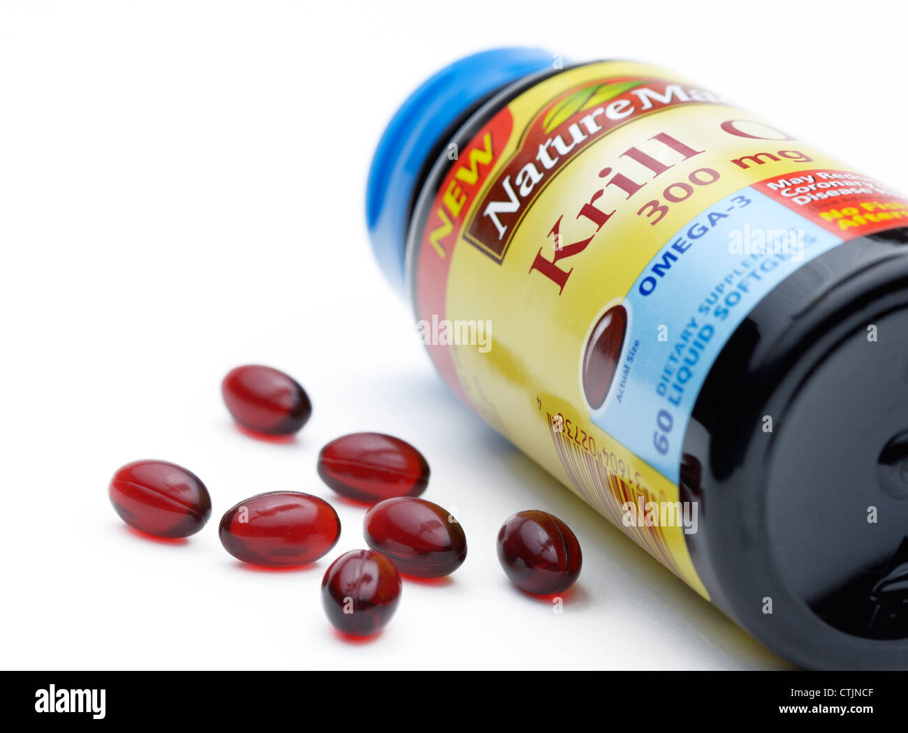 Krill oil pills, a supplemental source of Omega-3 fatty acids Stock Photo