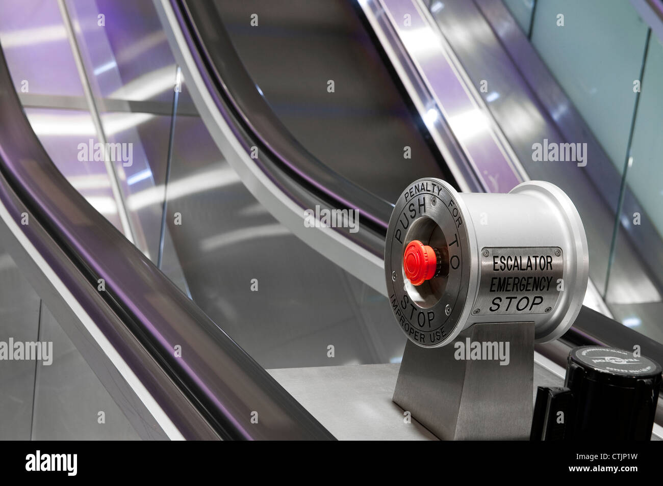 Emergency stop button on escalators in a London railway station, England. Stock Photo