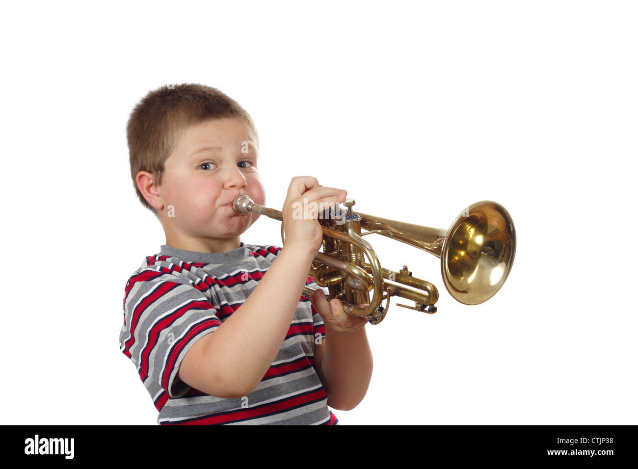 Boy Blowing Trumpet photo on the white background Stock Photo Alamy