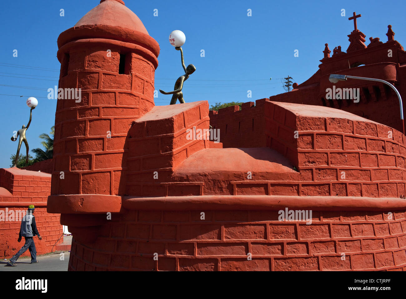 A man enter the Old City of Diu through one of its historical gates being a part of the city wall surrounding the Old City, Diu, Stock Photo