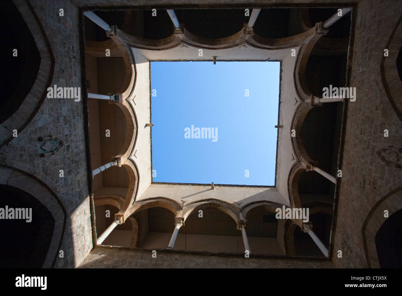 View on sky from inner yard in Sicilian palace Stock Photo