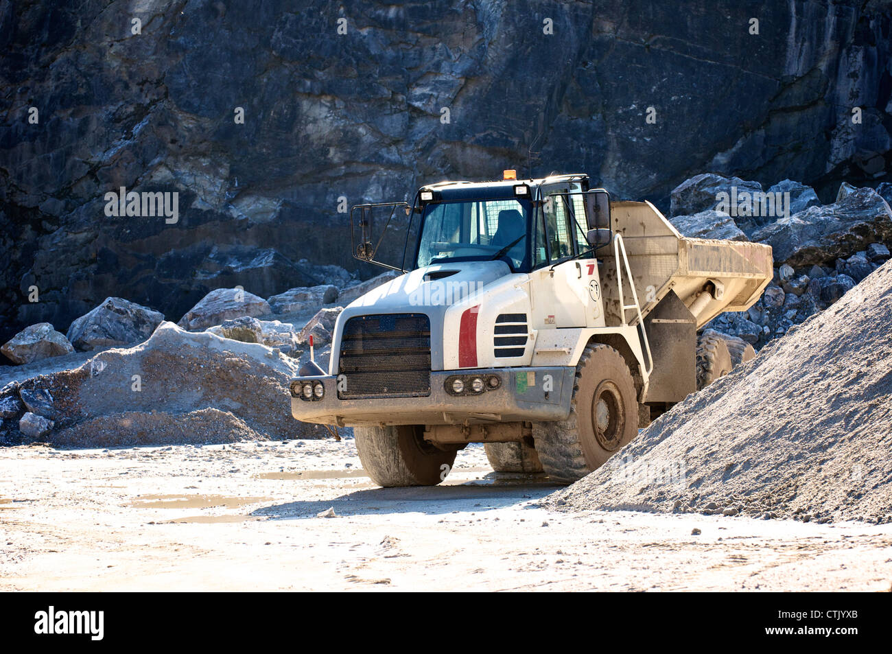 Tipper truck in lime quarry Stock Photo