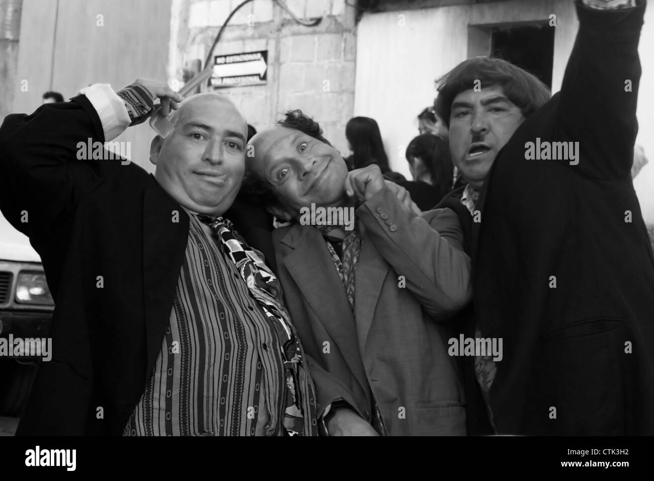 Men dressed as The three Stooges Stock Photo
