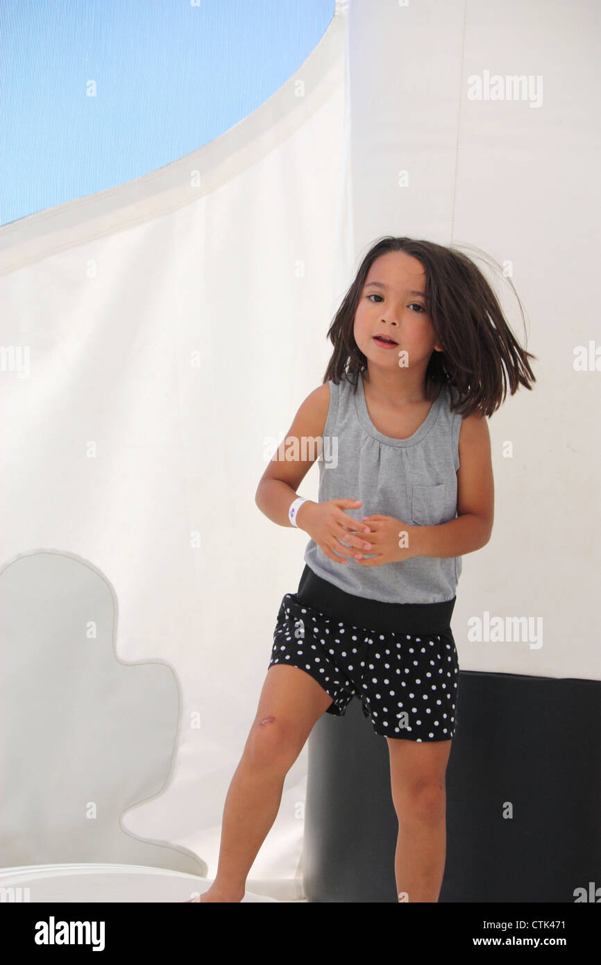 Little Girl Playing in Bounce House Stock Photo Alamy