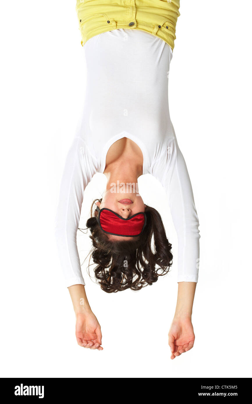 Vertical image of a girl sleeping upside down Stock Photo Alamy
