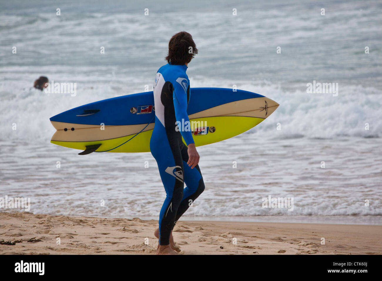 Surfer at Manly Beach, Sydney, NSW Stock Photo
