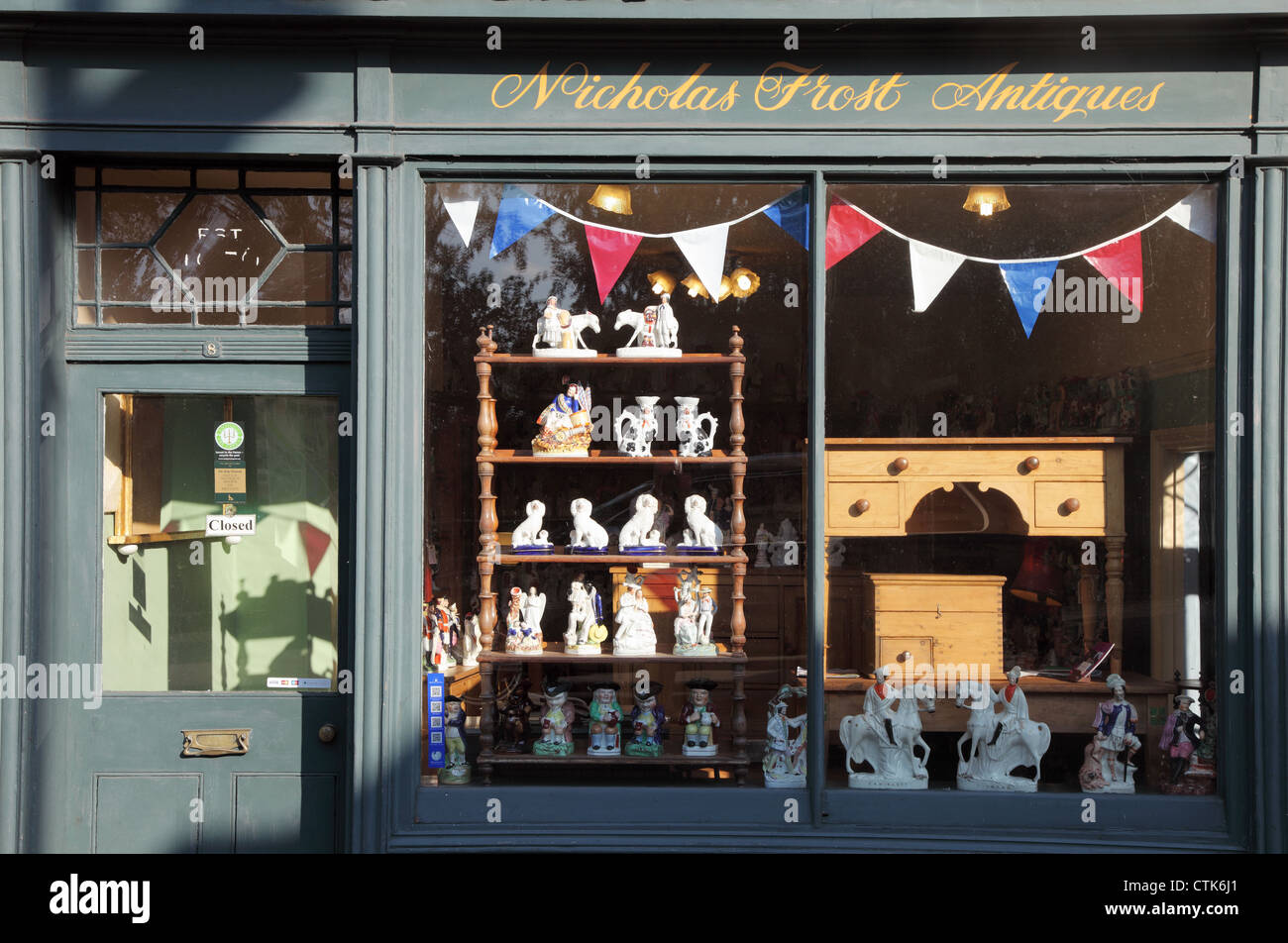 The window of Nicholas Frost's antique shop in Monmouth, Wales, UK