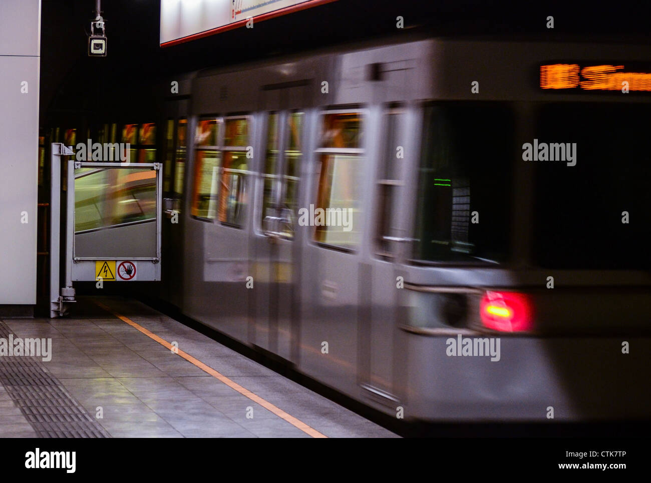 Blurred metro unit in motion and station Stock Photo - Alamy