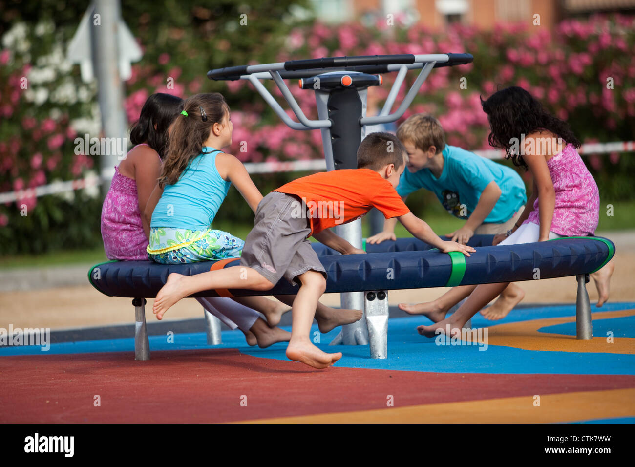 Children playing in a playground Stock Photo