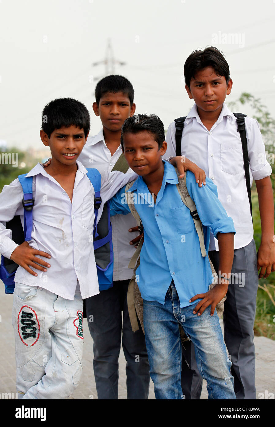 Friendly kids in school uniform Stock Photo Alamy