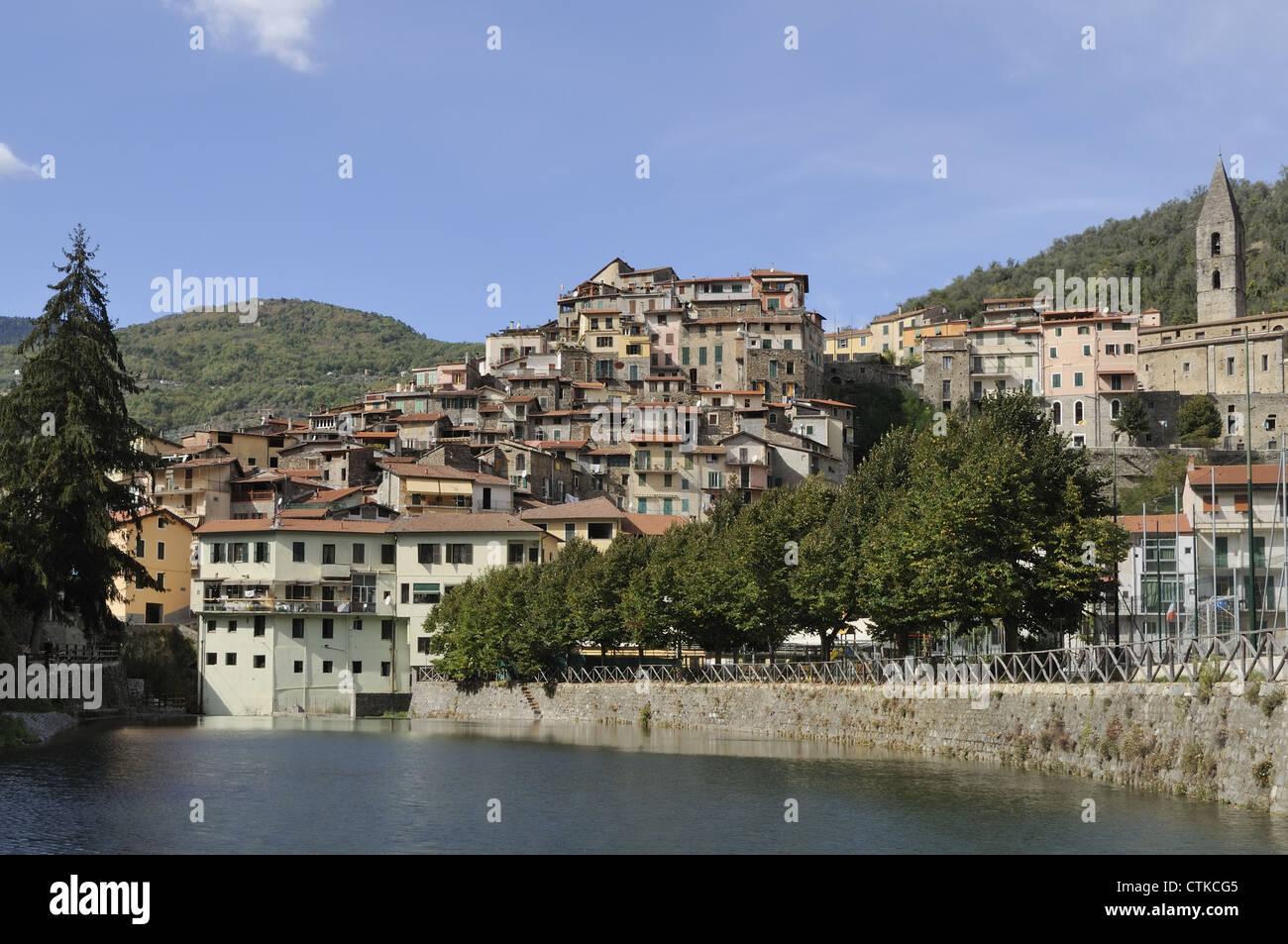 Pigna village and lake, Liguria view of medieval Mediterranean village in hilly inland landscape Stock Photo