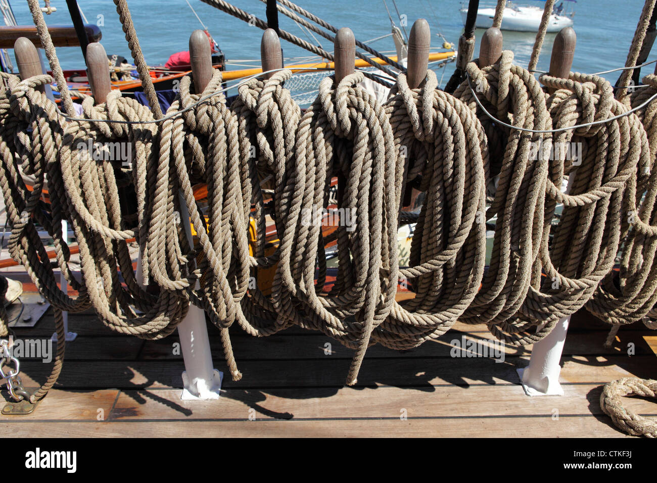 Ropes are neatly stored on a tall ship Stock Photo - Alamy