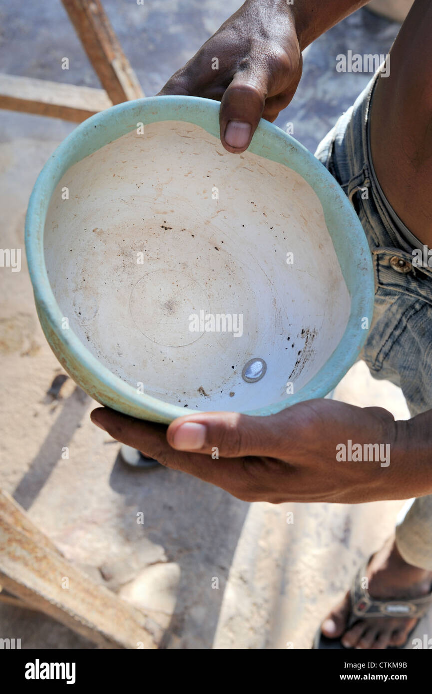 A bowl containing mercury, used in gold extraction Stock Photo