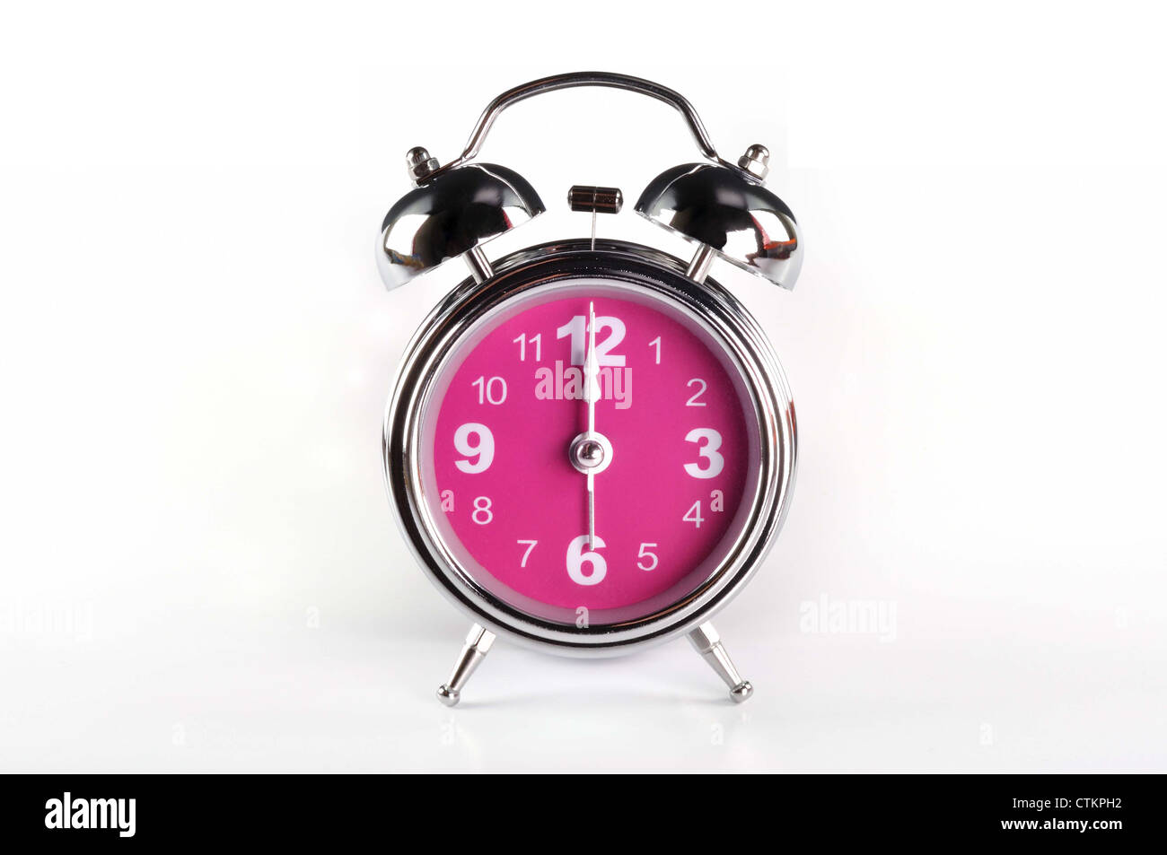 pink alarm clock isolated on white background Stock Photo