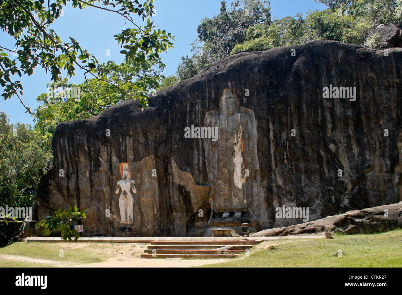 Rock-cut Buddha figures at Buduruwagala, Sri Lanka Stock Photo